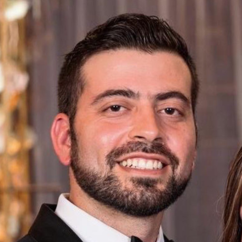 Headshot of Elishah Herman, Technical Co-Founder of Gotavi.